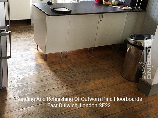 Sanding and refinishing of outworn pine floorboards in Dulwich 1