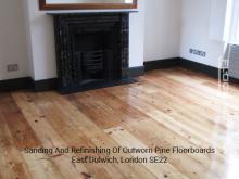 Sanding and refinishing of outworn pine floorboards in Dulwich 2