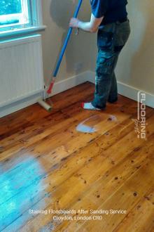 Staining floorboards after sanding service in Croydon 3