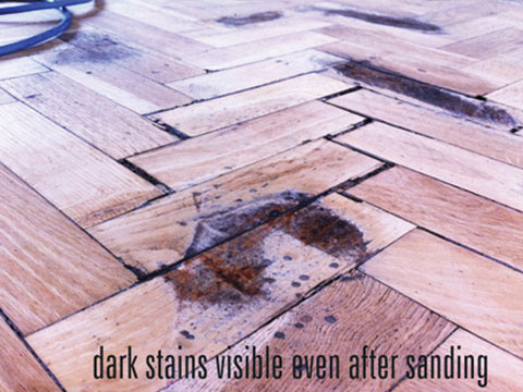 Dark stains on wood floors
