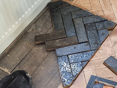 Parquet floor repairs - before