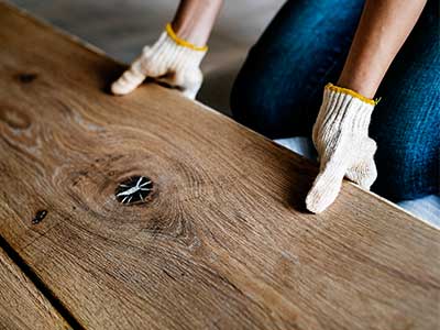 Can you install hardwood flooring on tiles