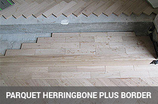 Parquet floor fitting in herringbone pattern and border