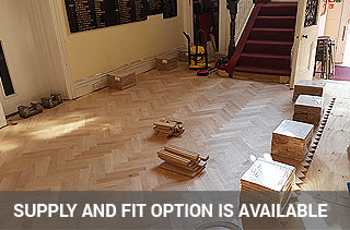 Supplying and fitting parquet blocks in a school