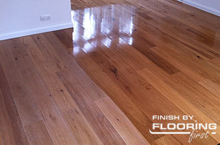 Wood floor during the application of the finish