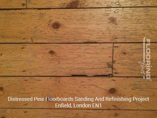 Distressed pine floorboards sanding and refinishing project in Enfield