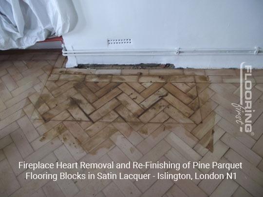 Fireplace heart removal and refinishing of pine parquet flooring blocks in satin lacquer in Islington 1