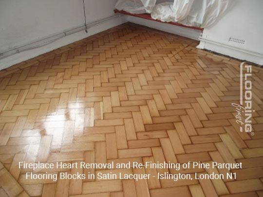 Fireplace heart removal and refinishing of pine parquet flooring blocks in satin lacquer in Islington 2
