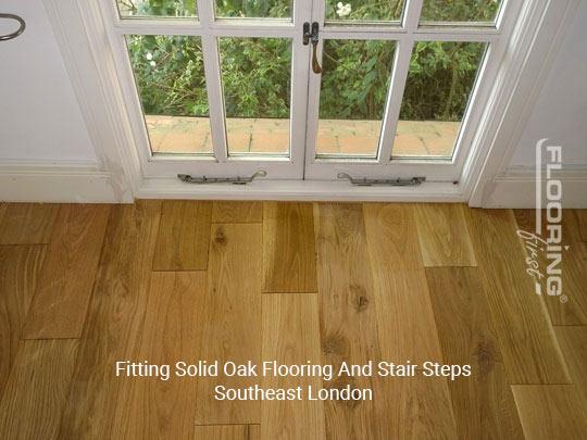 Fitting solid oak flooring and Stair steps in Southeast London 4