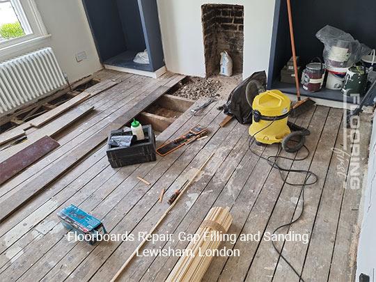 Floorboards repair, gap filling and sanding in Lewisham