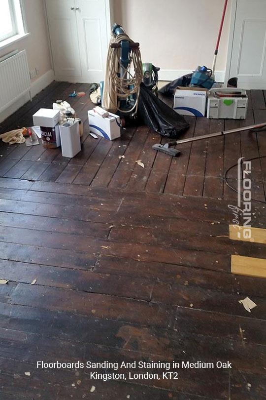 Medium oak floorboards sanding and staining in Kingston 1