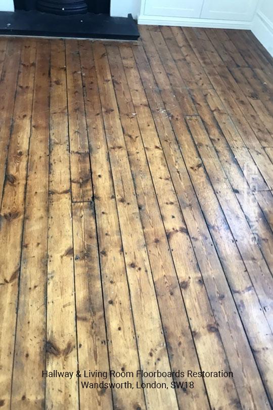 Hallway and living room floorboards restoration in Wandsworth