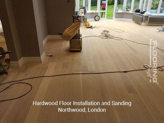 Hardwood floor installation and sanding in Northwood 1