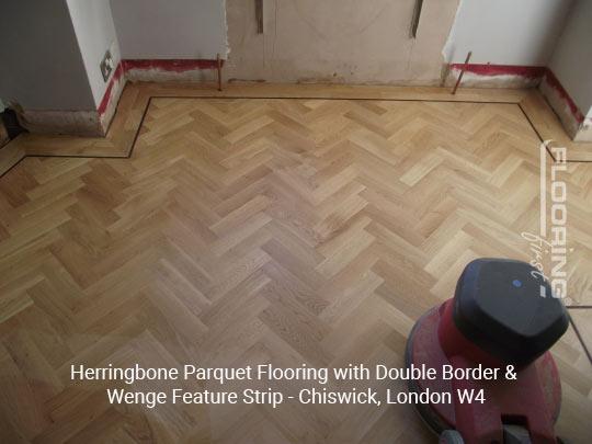 Herringbone parquet flooring with double border & wenge feature strip in Chiswick