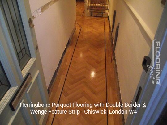 Herringbone parquet flooring with double border & wenge feature strip in Chiswick 2