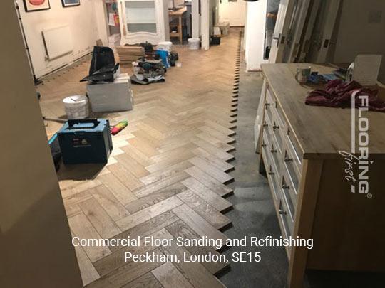 Prefinished oak parquet floor fitting in Peckham