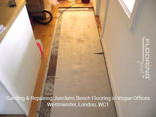 Sanding & repairing Junckers beech flooring in Vogue offices in Westminster