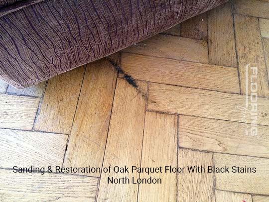 Sanding & restoration of oak parquet floor with black stains in North London 1