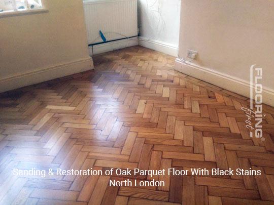 Sanding & restoration of oak parquet floor with black stains in North London 3