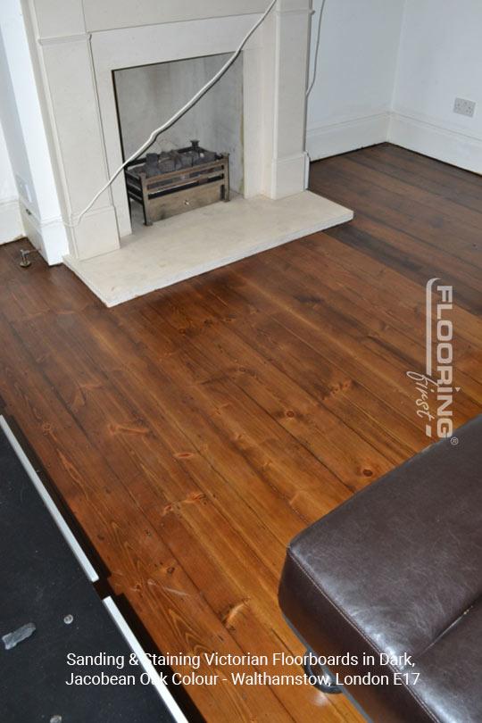Sanding & staining Victorian floorboards in dark, Jacobean oak colour in Walthamstow