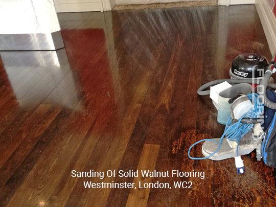 Sanding of solid walnut flooring in Westminster