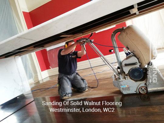 Sanding of solid walnut flooring in Westminster 1