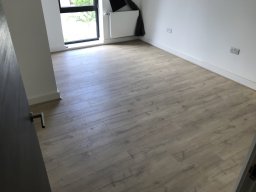 Laminate Floor Fitting in Poplar, E14 in Stepney