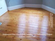 Distressed pine floorboards sanding and refinishing project in Enfield 3