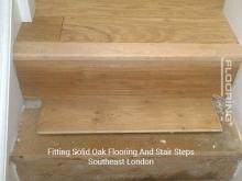 Fitting solid oak flooring and Stair steps in Southeast London 3