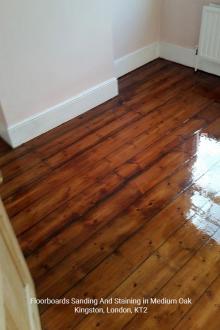 Medium oak floorboards sanding and staining in Kingston 2