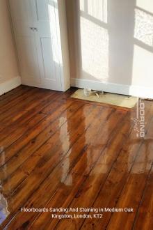 Medium oak floorboards sanding and staining in Kingston 3