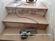 Hardwood floor and stairs repair, sanding and gap filling in Fulham