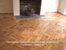 Herringbone parquet blocks fitting with single border in Paddington 2