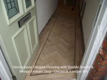 Herringbone parquet flooring with double border & wenge feature strip in Chiswick 1