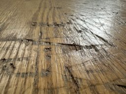 Deep marks from piano wheels, fixed by FlooringFirst