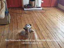 Pine floorboards sanding & gap filling with wood slivers in Lambeth 1