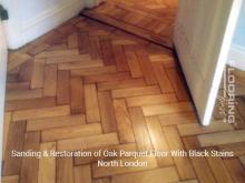 Sanding & restoration of oak parquet floor with black stains in North London 2
