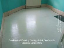 Sanding and painting damaged oak floorboards in London Borough of Croydon 3