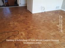 Sanding and refinishing of teak mosaic fingers flooring in Southwest London 3
