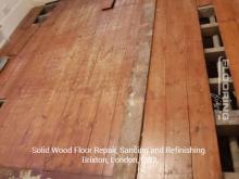 Solid wood floor repair, sanding and refinishing in Brixton 1