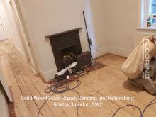 Solid wood floor repair, sanding and refinishing in Brixton 7
