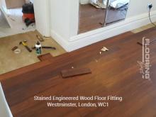 Stained engineered wood floor fitting in Westminster 3