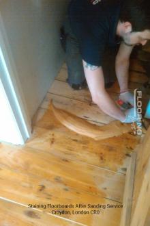 Staining floorboards after sanding service in Croydon 2