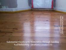 Substantial floorboards restoration through sanding and refinishing in Stratford 4
