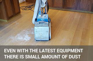 Belt sanding machine and dust on the floor | FlooringFirst! Belt sanding machine and dust on the floor