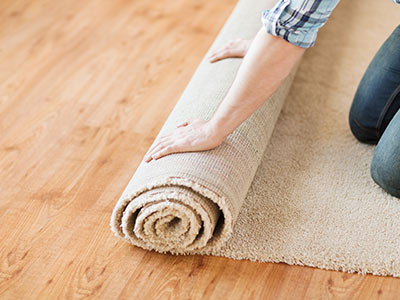 Cover your floor with rugs and mats