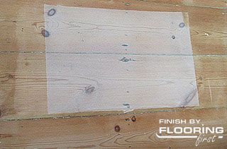 Sample of whitewash finish applied on wooden flooring