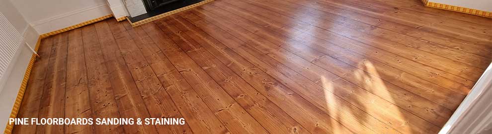 Pine floorboards sanding and staining