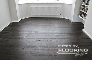 Dark hardwood flooring installed by FlooringFirst!