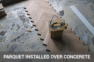 Parquet floor fitting over concrete subfloor